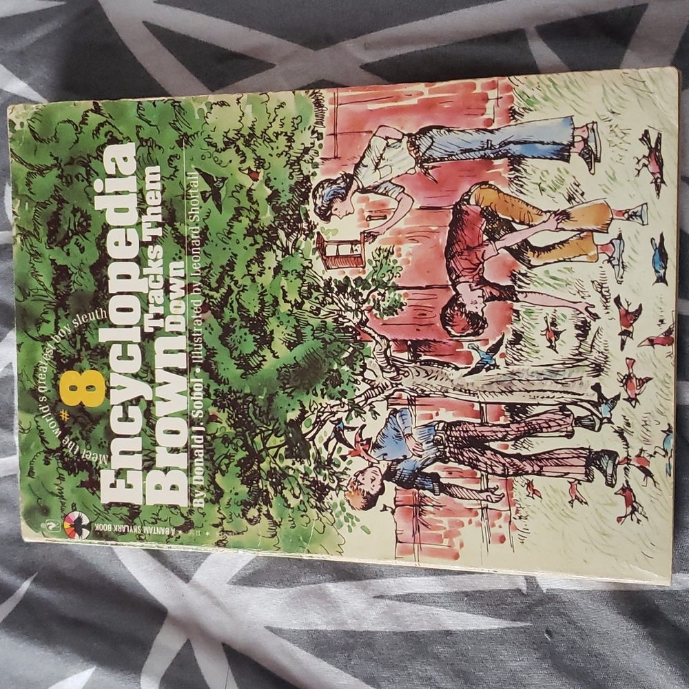 Encyclopedia Brown Tracks them Down book